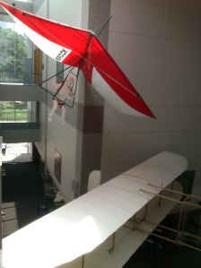Hang Glider Cruising above the Wright Flyer's Wing